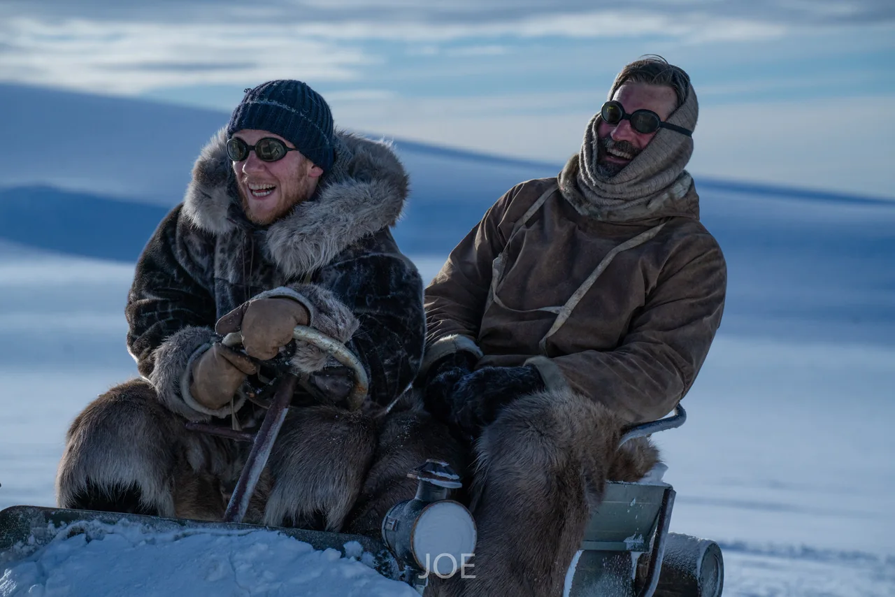 Nikolaj Coster-Waldau and Joe Cole laughing between takes